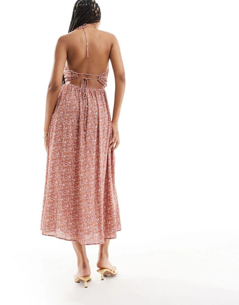 Shop ASOS DESIGN viscose cut out halter detail midi dress in rust