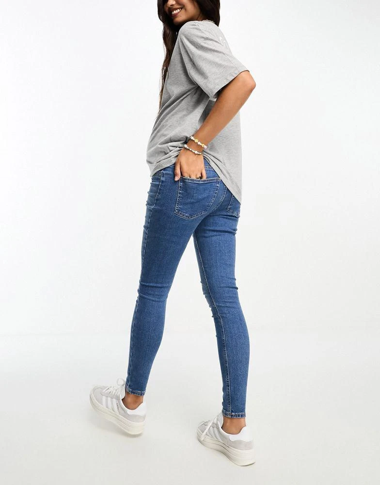 ASOS ASOS DESIGN Maternity ultimate skinny jeans with over bump in blue 2