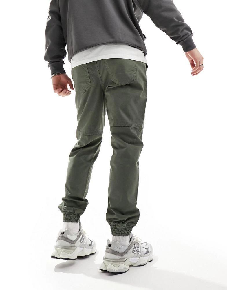 Another Influence Another Influence front pocket cargo trousers in washed khaki 2