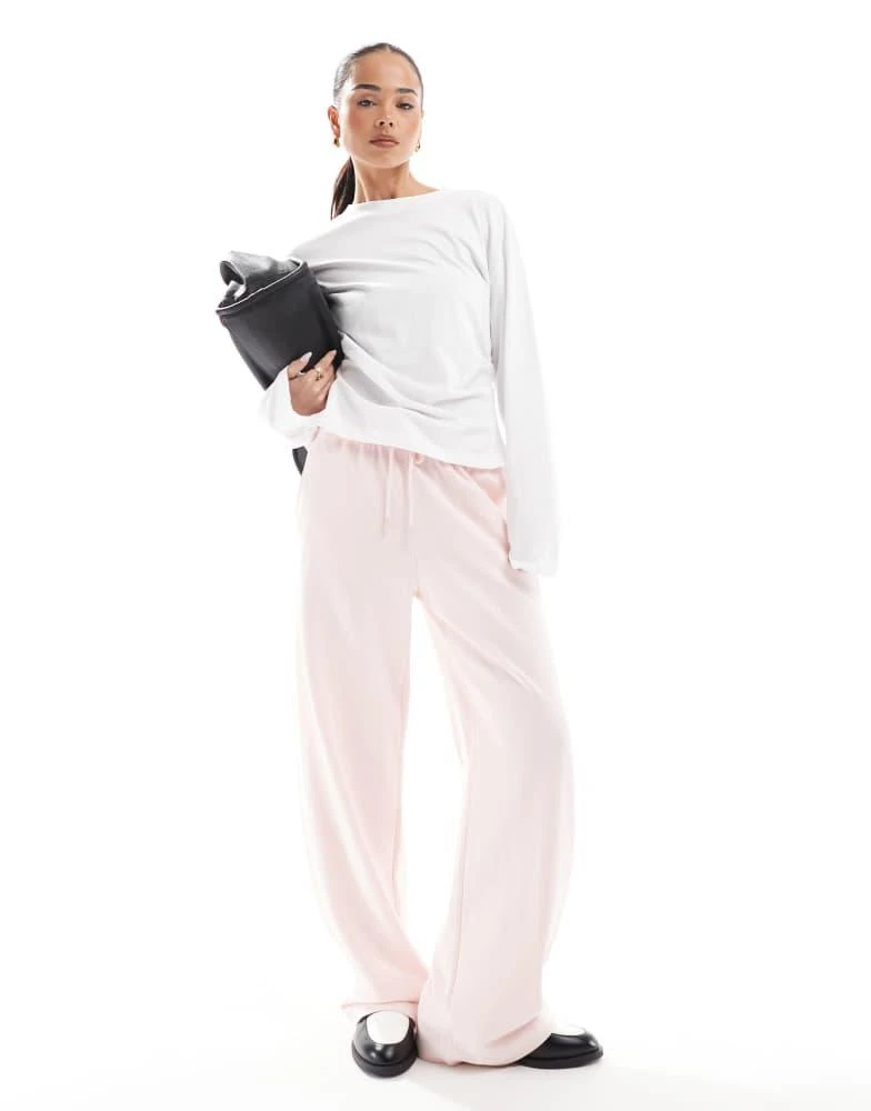 Bershka Bershka wide leg joggers in pale pink 1