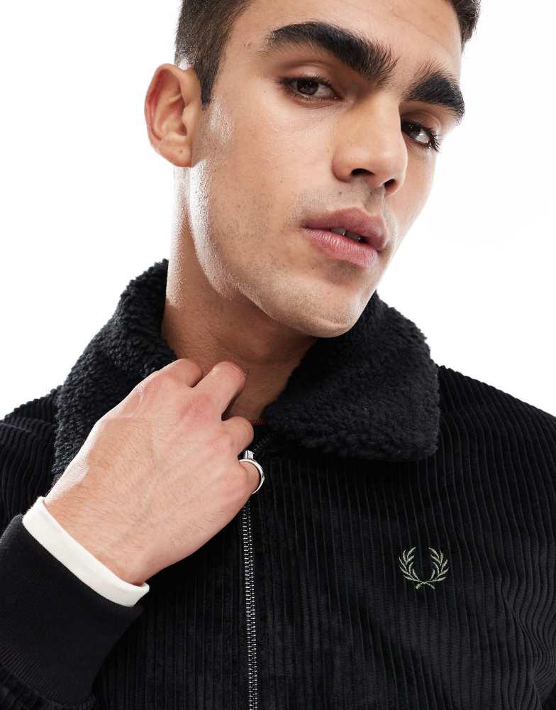 Shop Fred Perry cord bomber jacket in black with removable borg