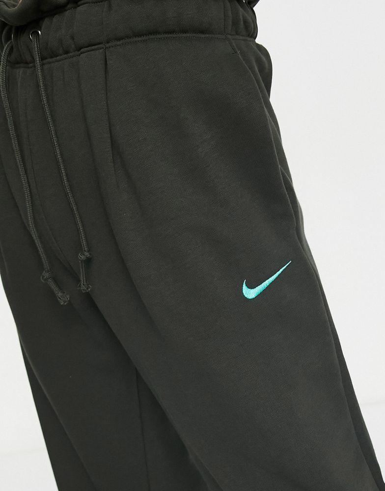 Nike modern fleece pants green online