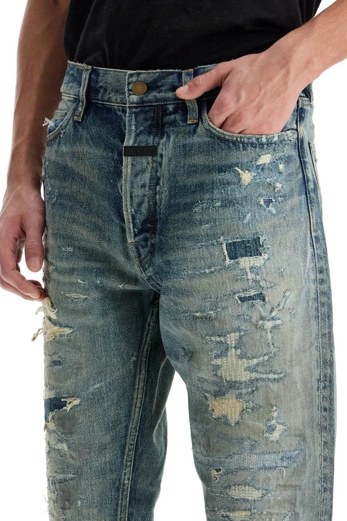 Fear of god distressed straight cut jeans with a 4