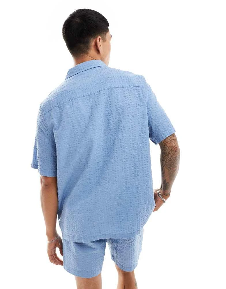 ASOS ASOS DESIGN co-ord 90s oversized short sleeve shirt in seersucker texture in dusty blue 4