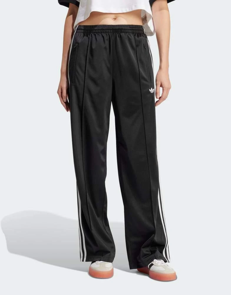 Adidas adidas Originals Firebird Loose track pants in black 1