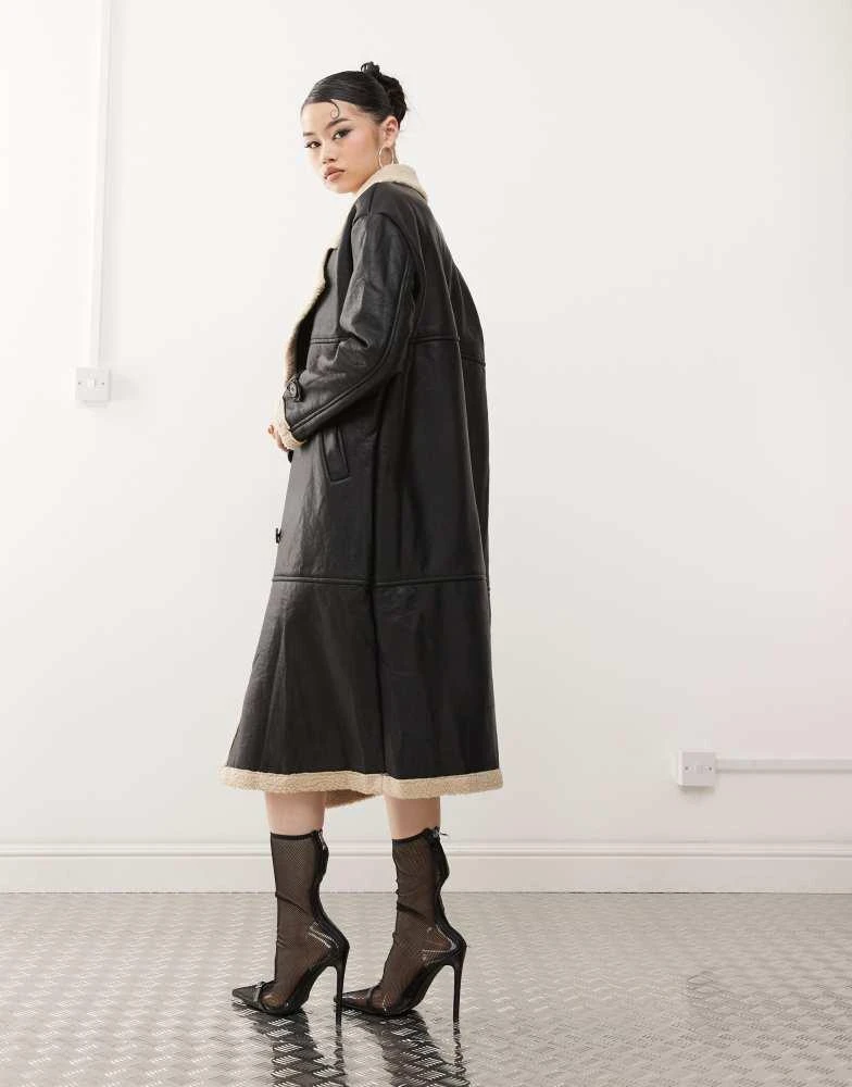 Princess Polly Princess Polly leather look contrast faux shearling button front longline coat in black and beige 4