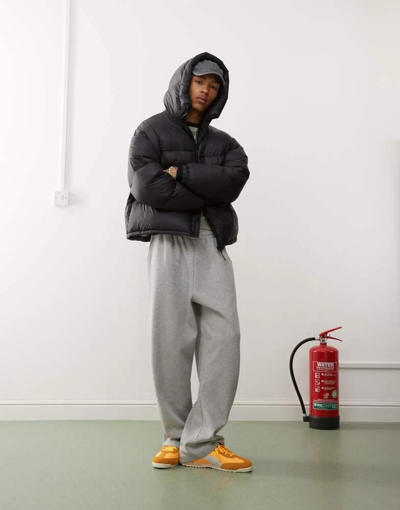 Weekday Weekday down hooded puffer coat with zip pockets in black 2