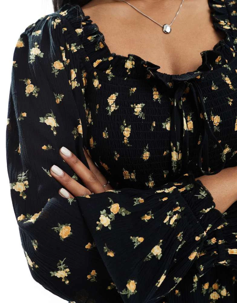 Miss Selfridge Miss Selfridge long sleeve floral playsuit in black 4