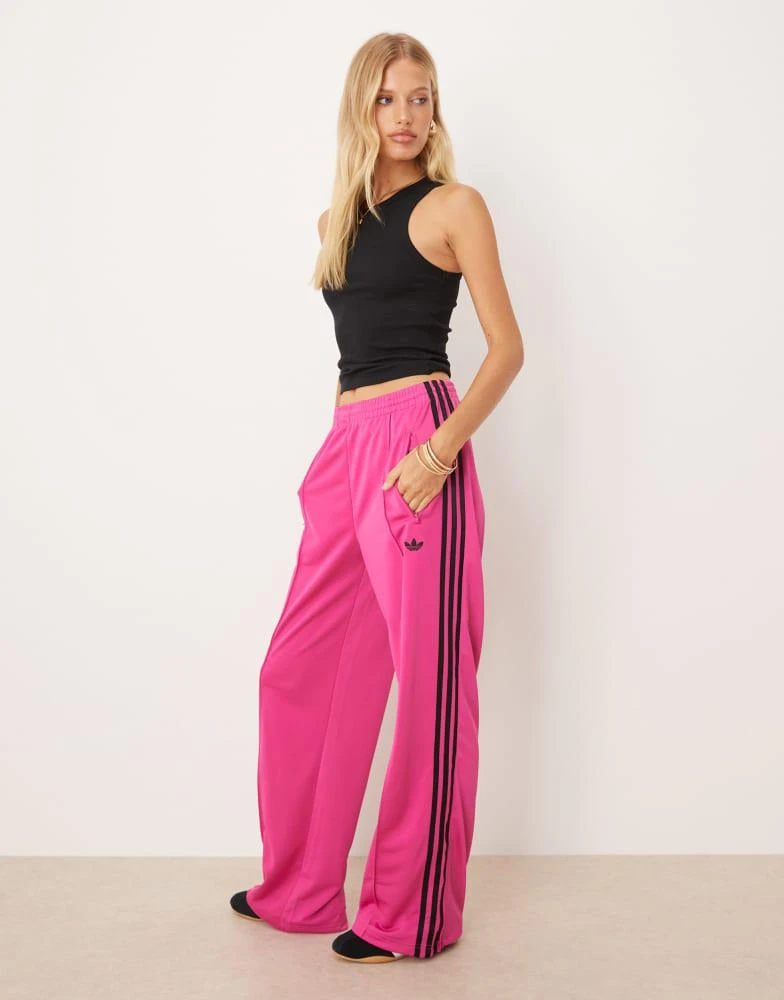Adidas adidas Originals Adicolor classic firebird loose track pants in fuchsia and black 1