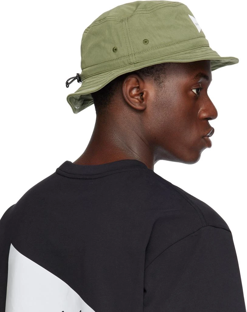 and wander Khaki Gramicci Edition Nyco Bucket Hat 3