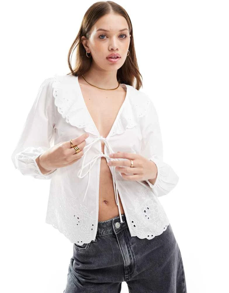Stradivarius Stradivarius tie detail puff sleeve blouse in white 1