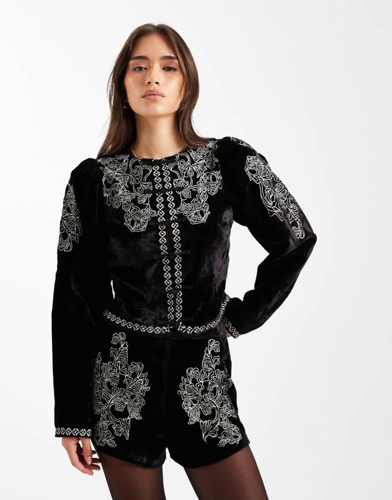 sachin and babi light blue dress What to wear to a Winter or Fall wedding main image 0