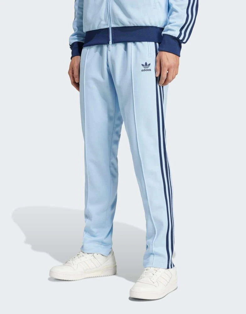 Adidas adidas Originals Classics track pants in light blue 1