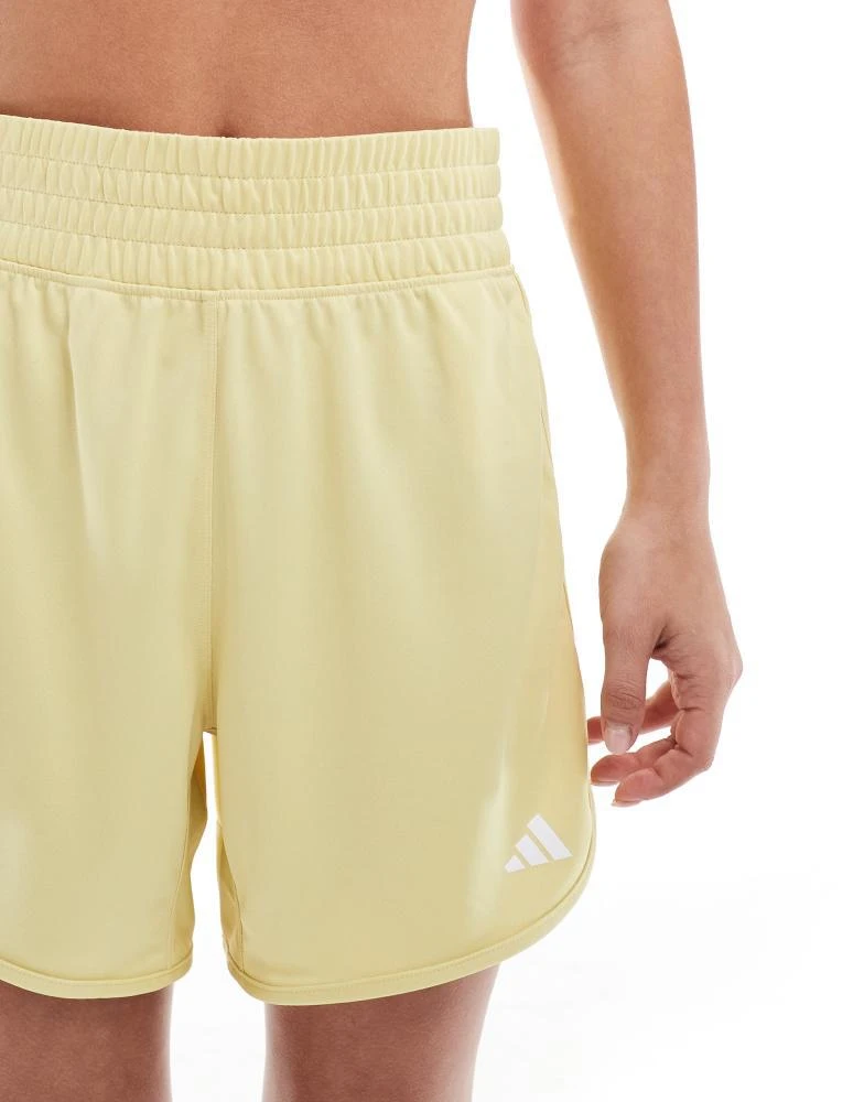 Adidas adidas Performance pacer essentials knit high-rise shorts in yellow 3