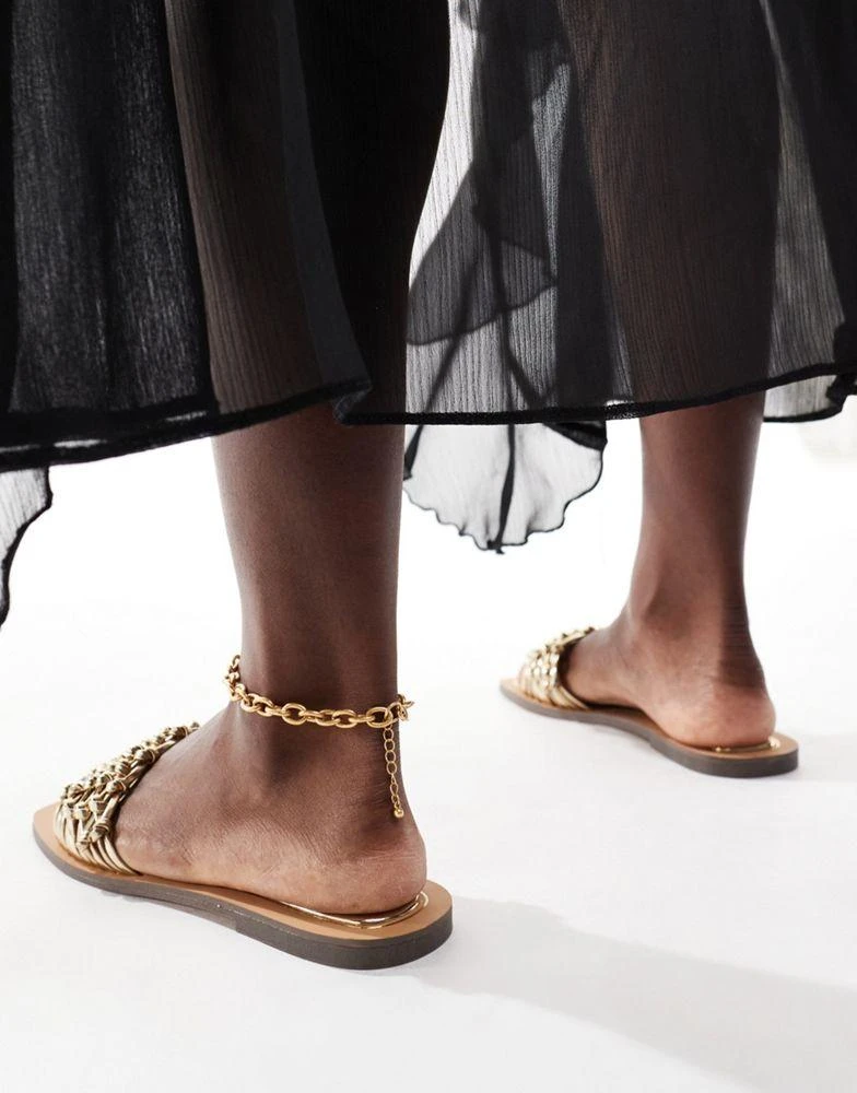Bershka Bershka woven flat sandals in gold 3