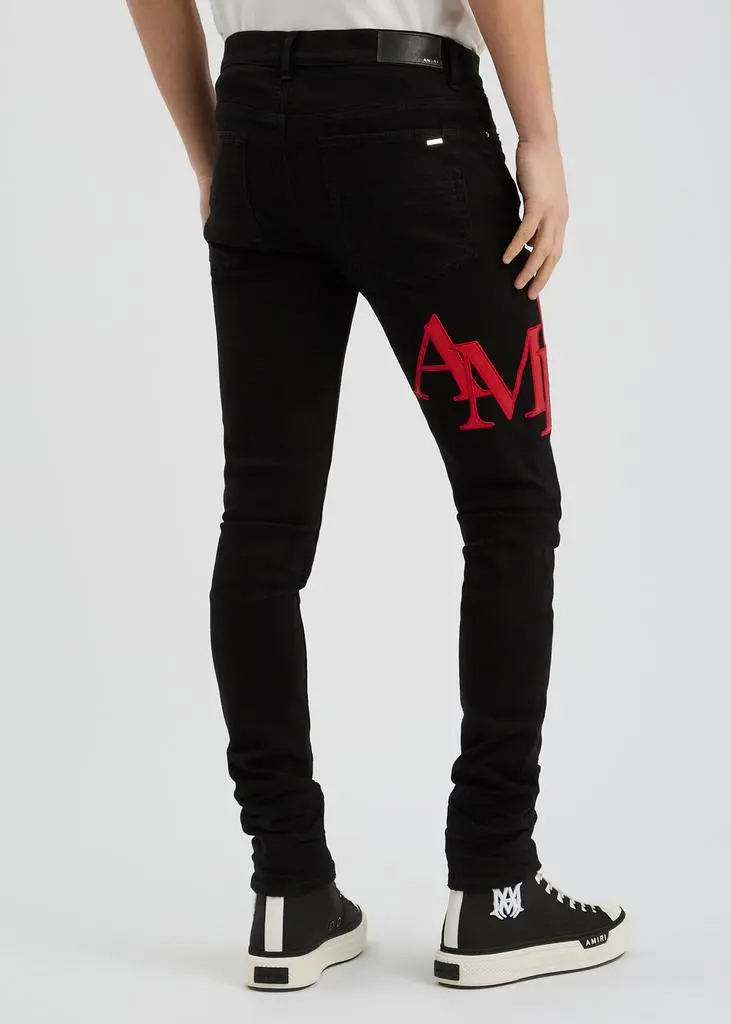AMIRI Staggered logo skinny jeans  3