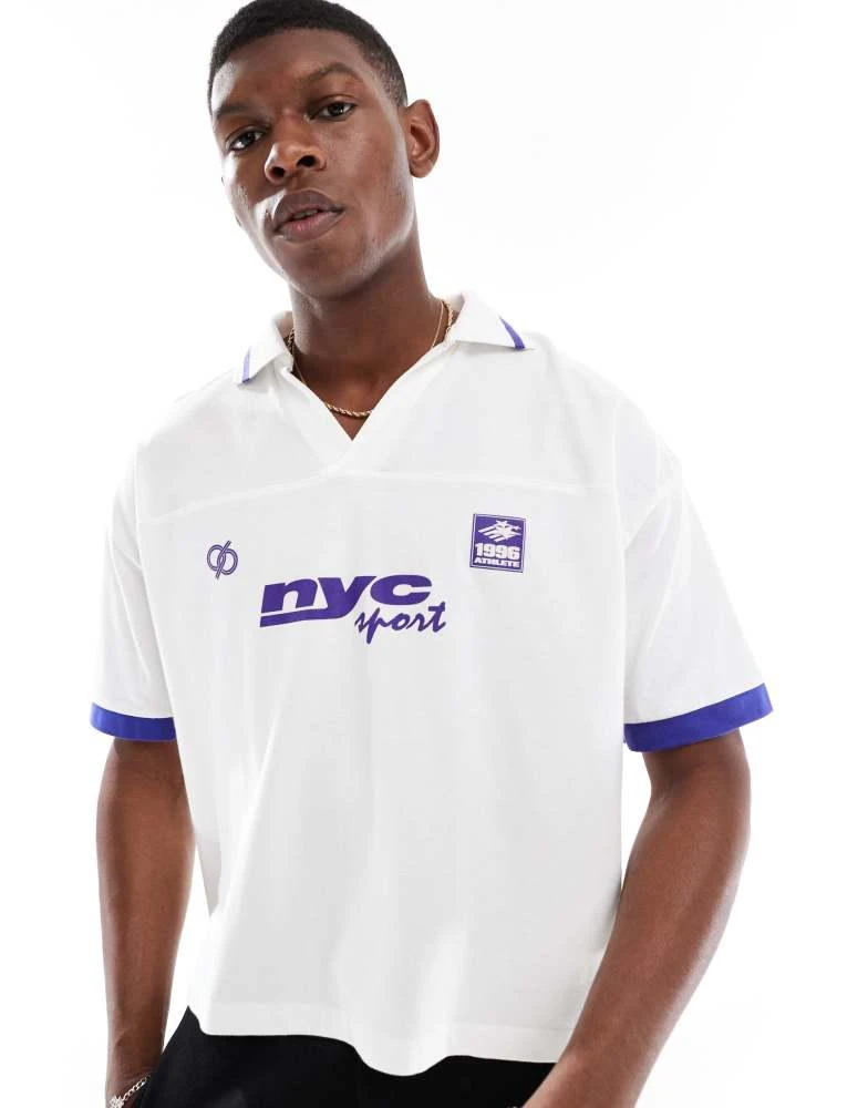 ASOS ASOS DESIGN boxy oversized polo with cut and sew and sports graphics in white 1