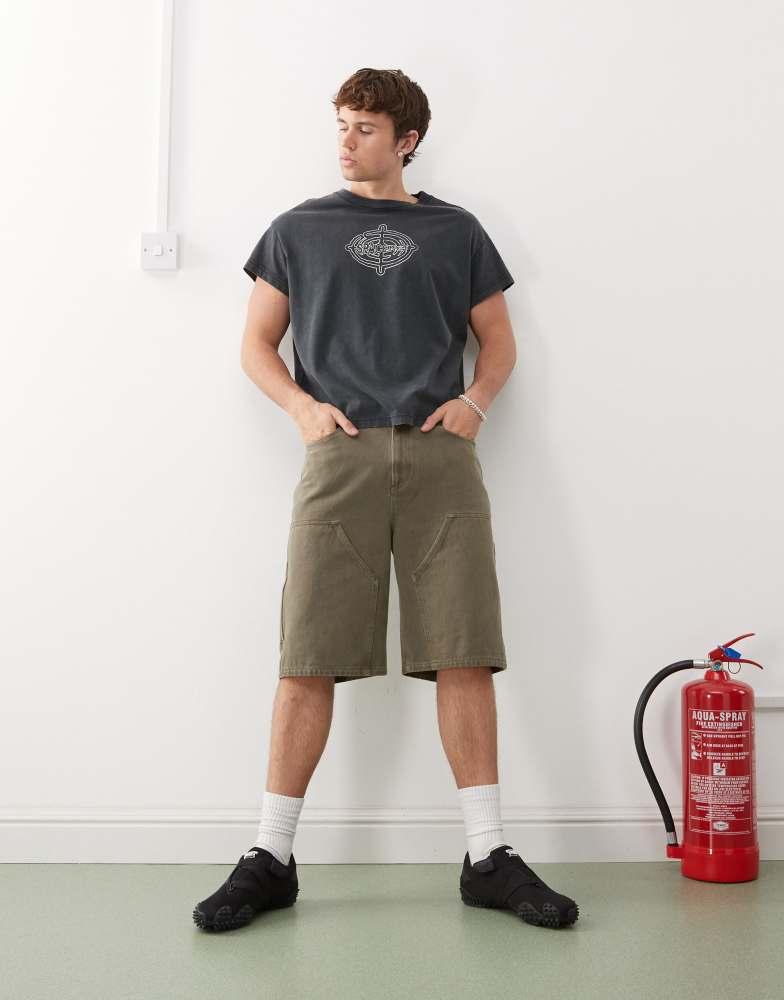 Weekday Weekday boxy fit t-shirt with cap sleeves and graphic print in washed black