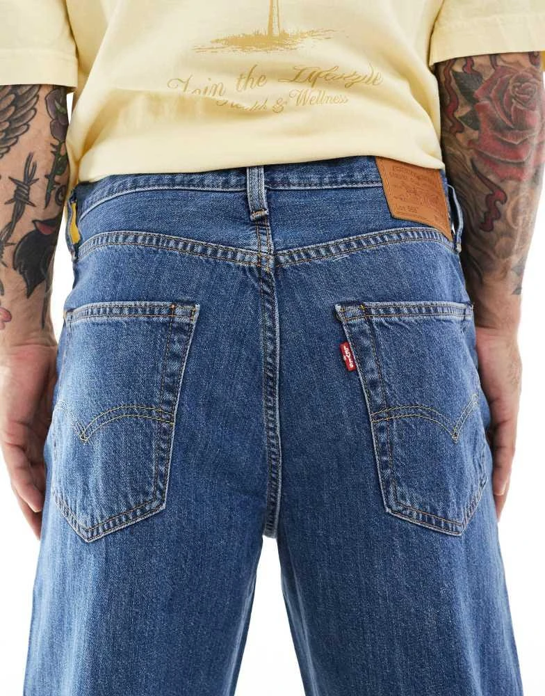 Levi's Levi's 568 loose straight fit lightweight cotton linen mix jeans in mid blue 4