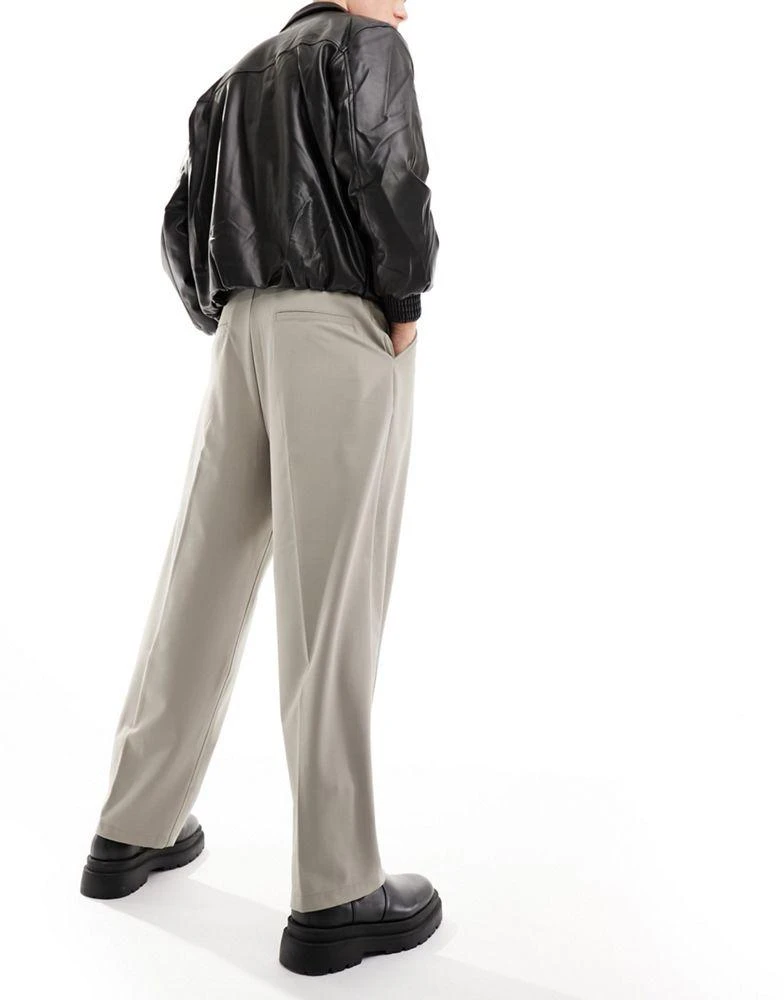 Bershka Bershka baggy tailored trouser in beige 5