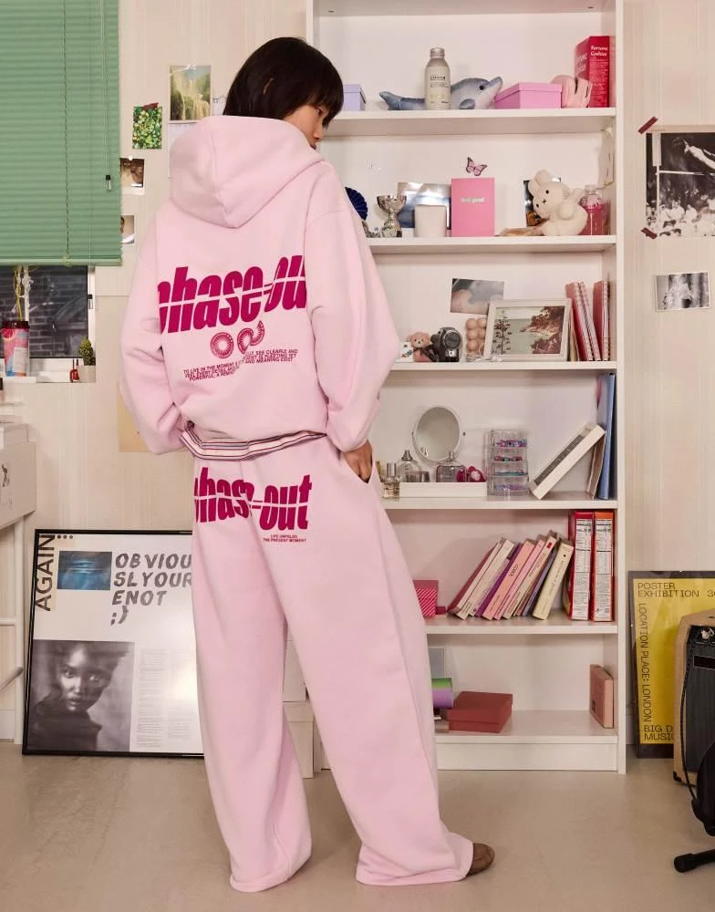 Bershka Bershka Printed wide-leg plush trousers in pink