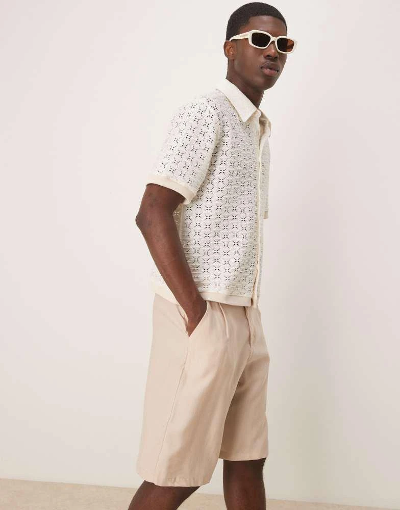 ASOS ASOS DESIGN oversize smart bermuda shorts with belt detail in neutral 1