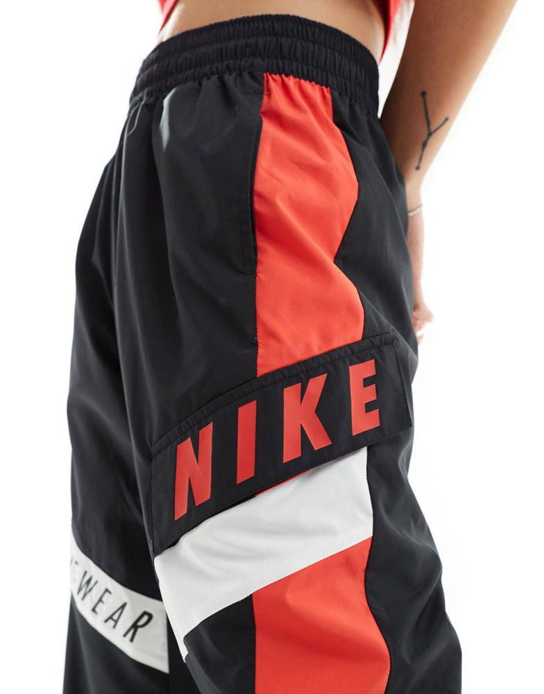 Nike Nike Streetwear woven trackpant in black and red