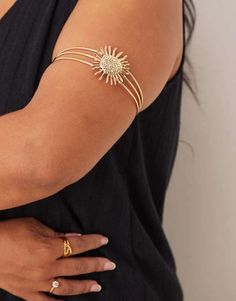 ASOS ASOS DESIGN Curve arm cuff with enamelled sun design in gold tone 3