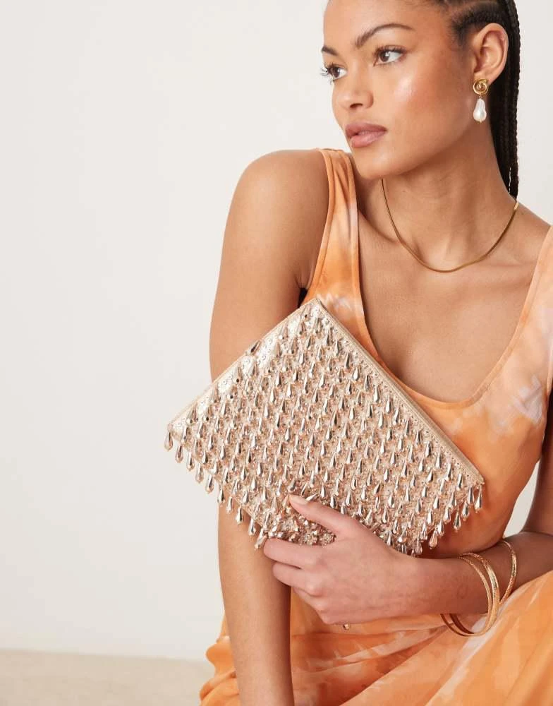 ASOS ASOS DESIGN zip top clutch bag in all over beads in rose gold 1