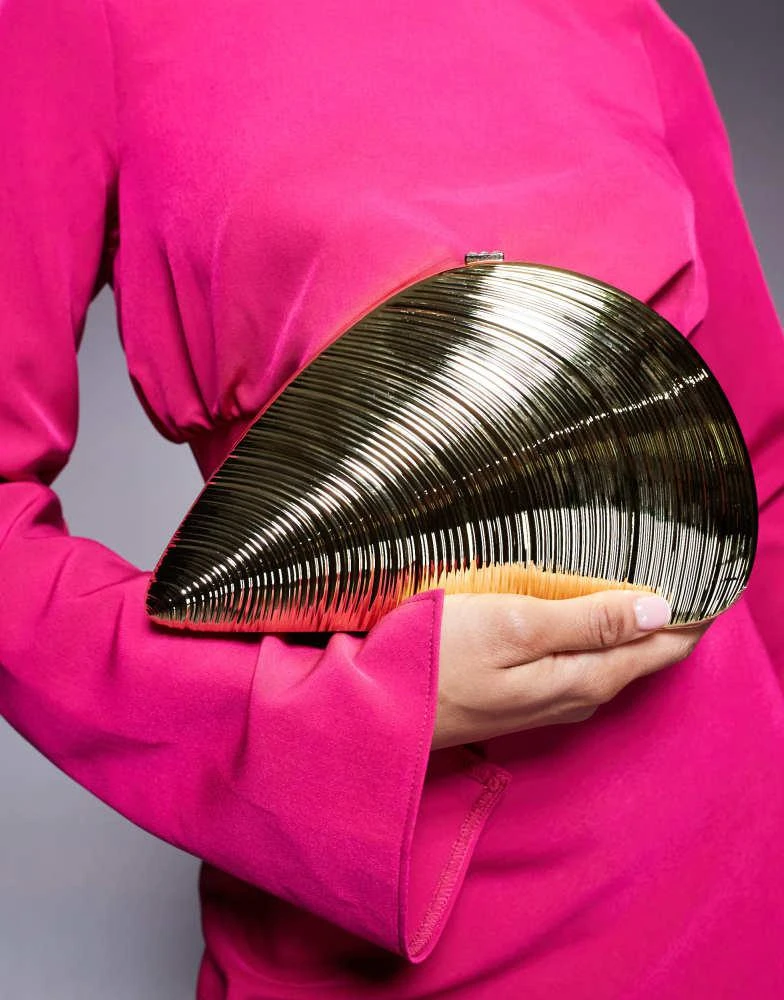 True Decadence True Decadence textured shell clutch bag in gold 1
