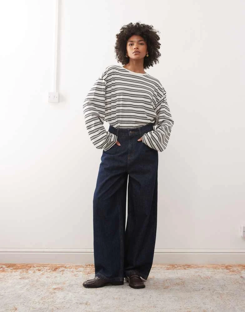 Monki Monki oversized long sleeve t-shirt with side slits in black and white stripe 2