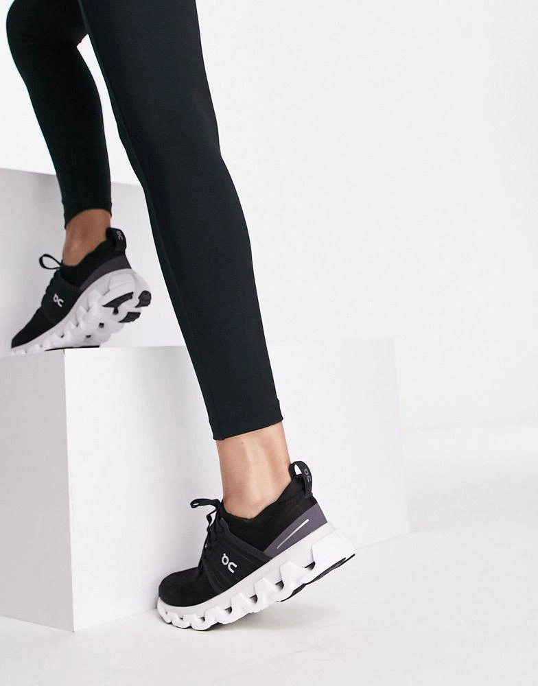 On ON Cloudswift 3 running trainers in black and white 3