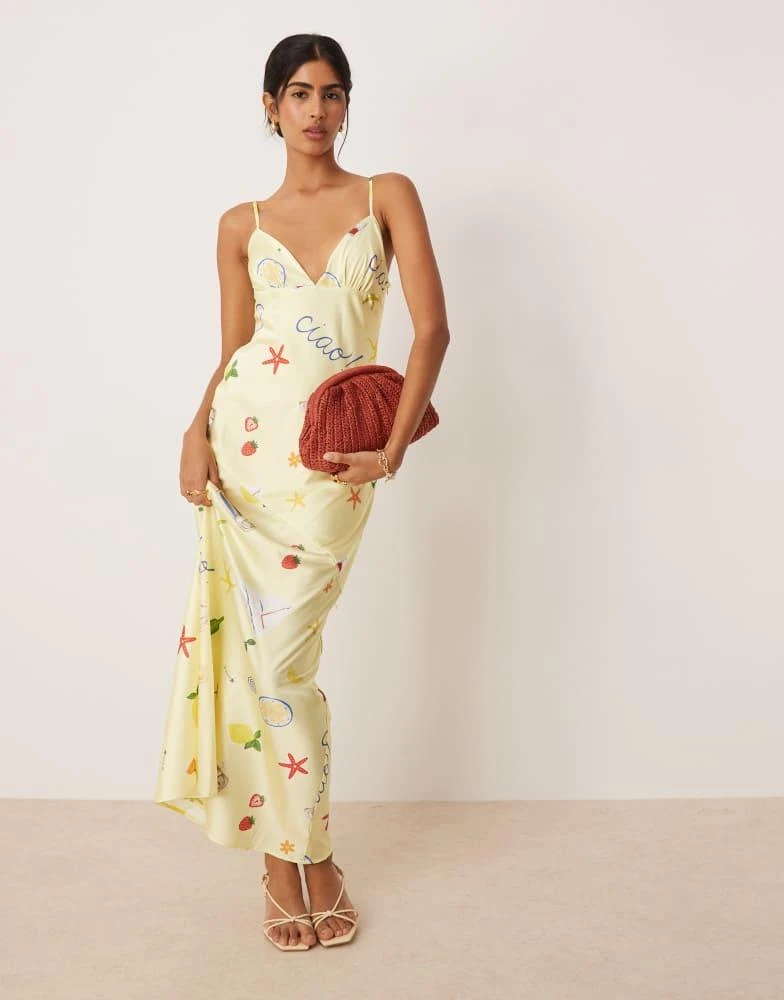 Shop For Love & Lemons Huda slip maxi dress in yellow postcard print on  Sale at BeyondStyle  Get 75% Off For Love & Lemons Huda slip maxi dress in  yellow postcard