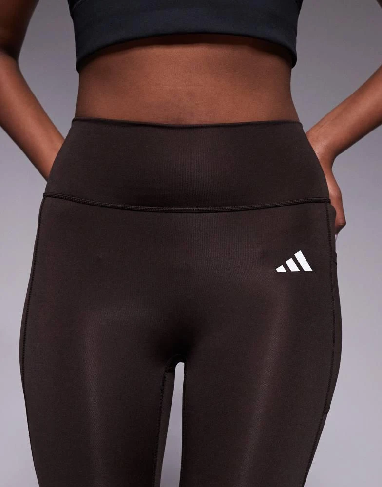 Adidas adidas Training Optime essentials 7/8 leggings in brown 5