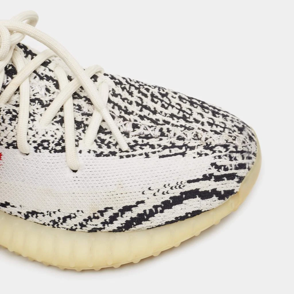 Shop Yeezy x Adidas White/Black Knit Fabric Boost 350 V2 Zebra Sneakers Size  39 1/3 on Sale at BeyondStyle  Get 35% Off Yeezy x Adidas White/Black Knit  Fabric Boost 350 V2