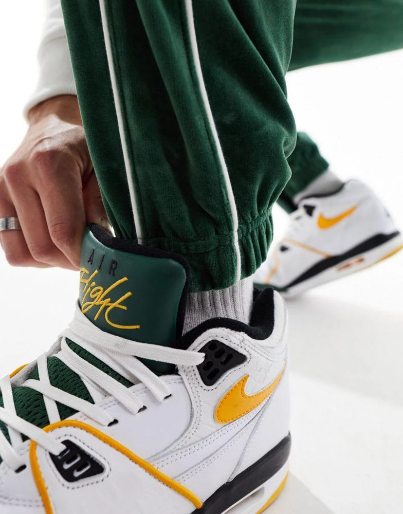NIKE Nike Club velour joggers in green 4