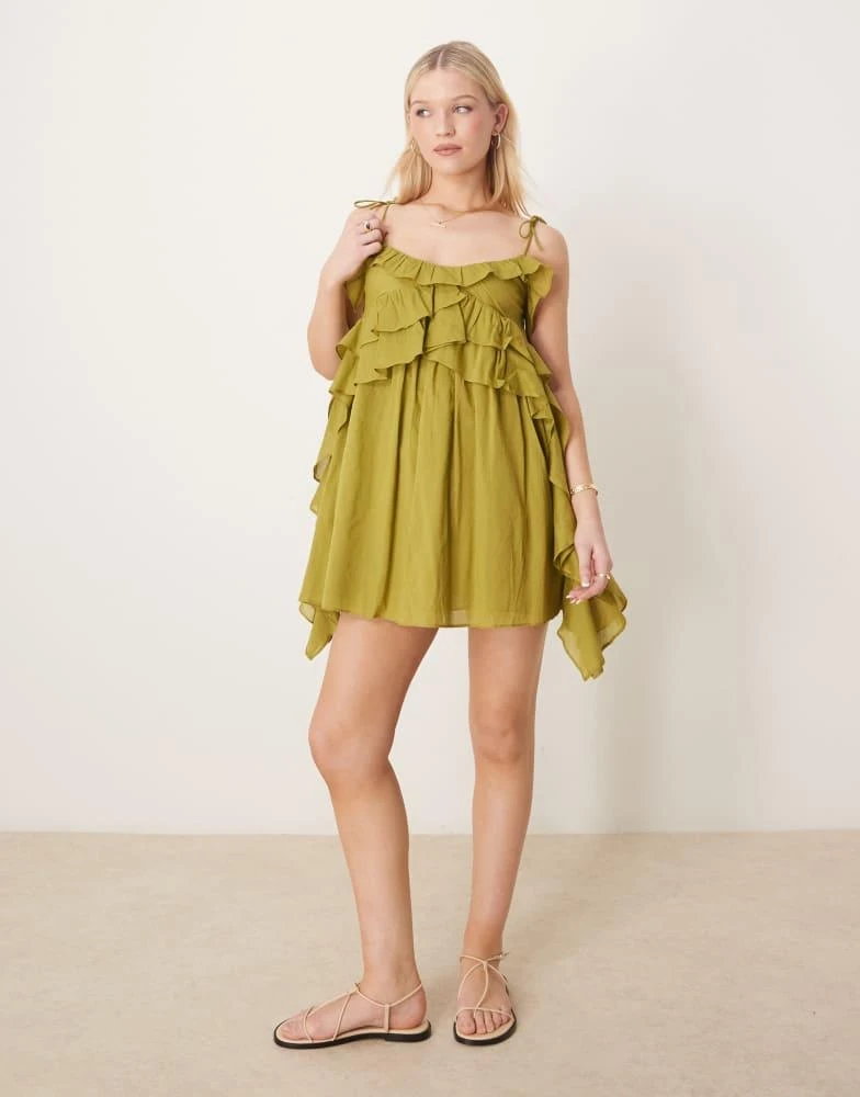 ASOS ASOS DESIGN scoop neck ruffle mini dress with tie straps in green 1