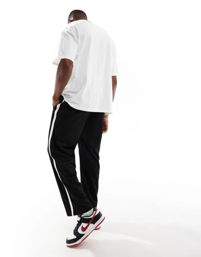 Bershka Bershka wide fit side panel joggers in black 3