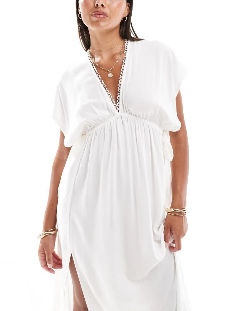 ASOS ASOS DESIGN Faye flutter sleeve maxi beach dress with channelled tie waist in white 4