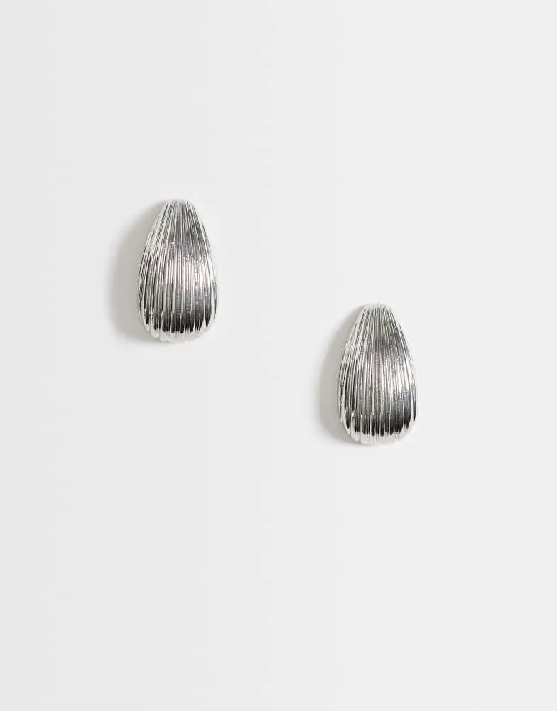 ASOS ASOS DESIGN stud earrings with teardrop ridged design in silver tone