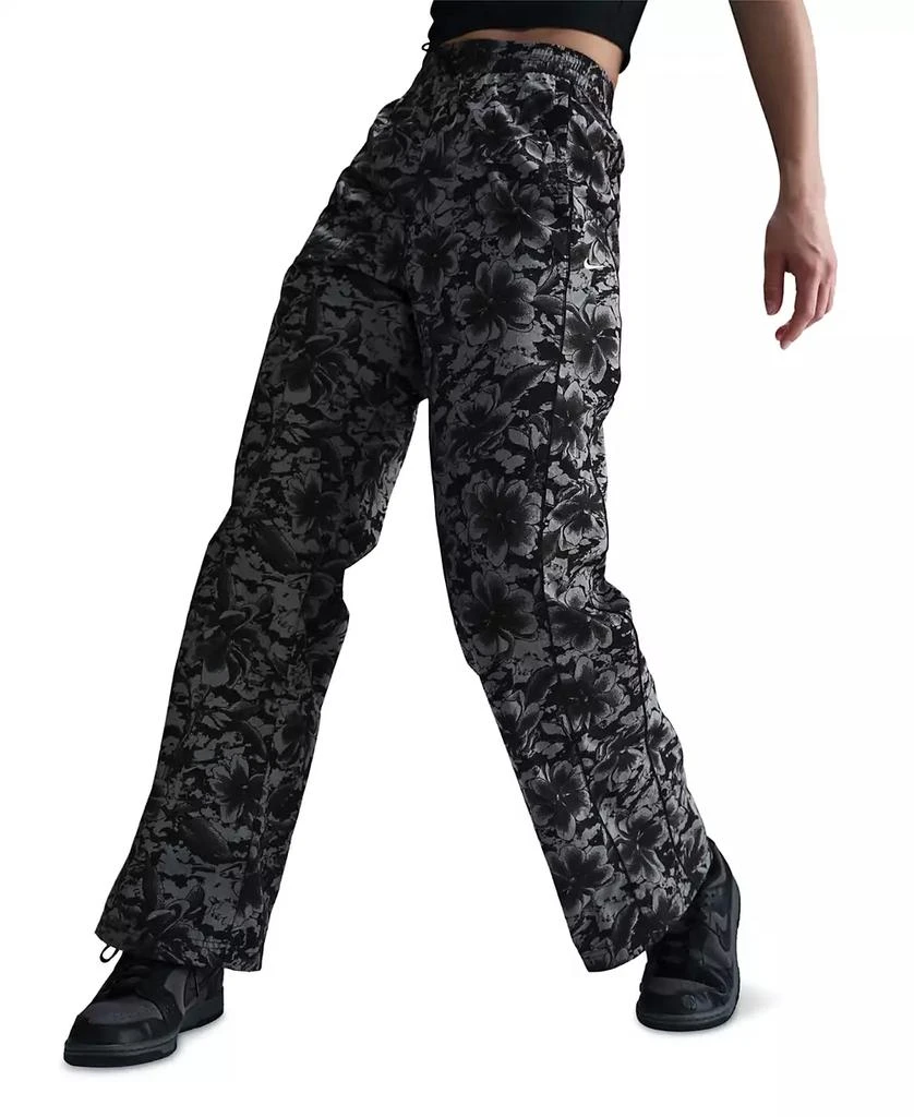 NIKE Sportswear Women's Windrunner Women's UV Woven Printed Pants 1