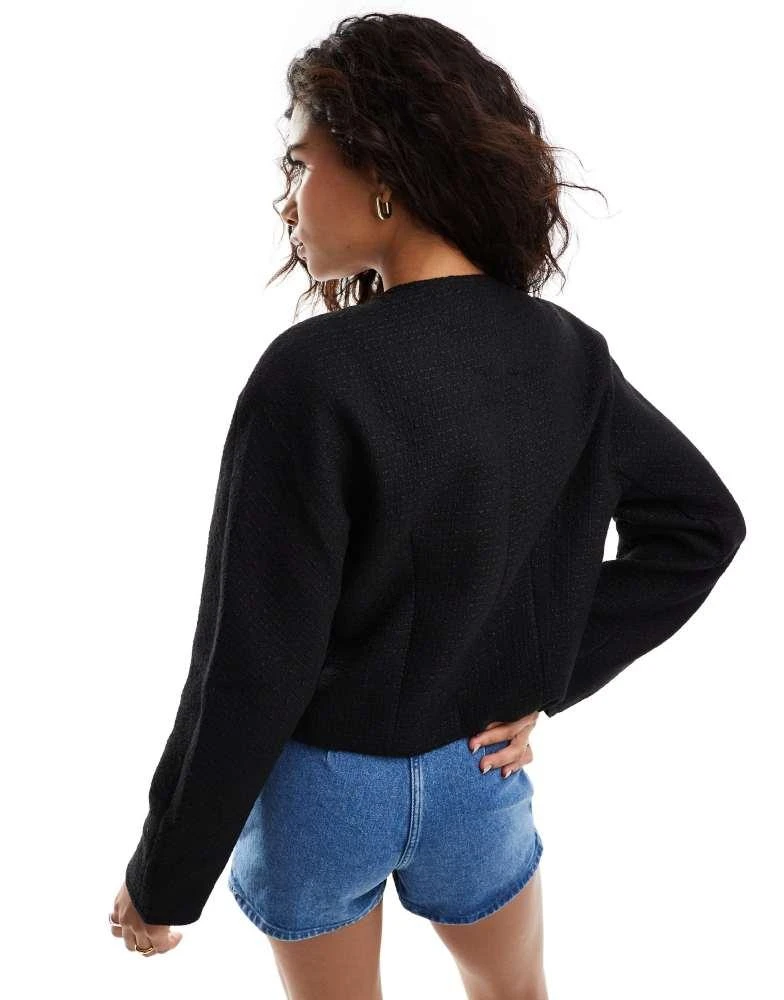 Moon River Moon River button front pocket detail textured cropped jacket in black 4