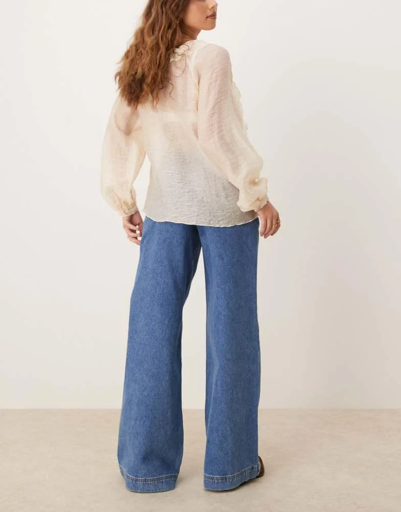 ASOS ASOS DESIGN pleated low rise jeans in mid blue 3
