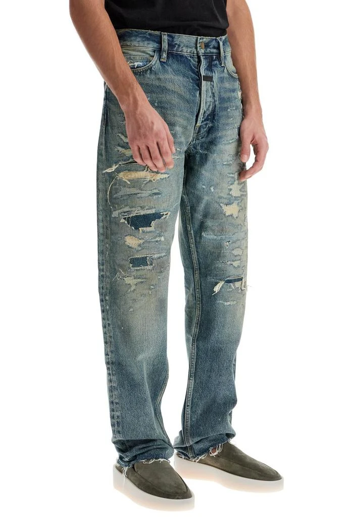 Fear of god distressed straight cut jeans with a 2