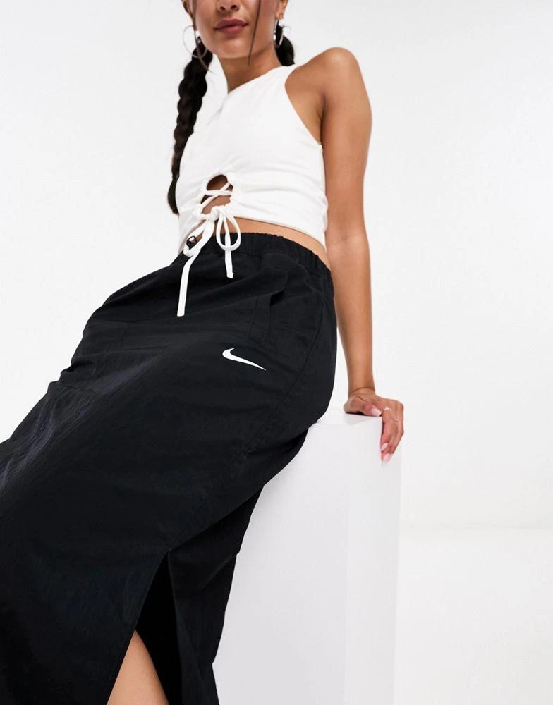 Nike Nike mini swoosh woven cargo maxi skirt in black 2
