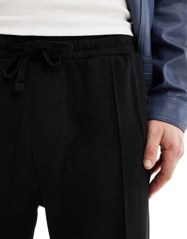 Bershka Bershka wide leg pintuck jogger in black 5