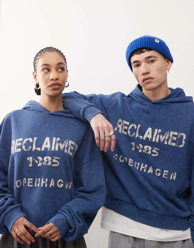 Reclaimed Vintage Reclaimed Vintage unisex graphic print hoodie in washed navy 1