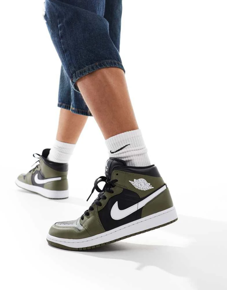 Shop Nike Air Jordan Mid trainers in black, olive and white on