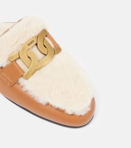 Tod's Catena shearling and leather mules 5