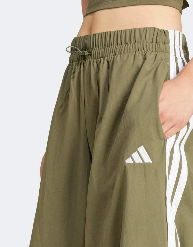 Adidas adidas Performance essentials 3-stripes lifestyle woven parachute pants in green 4
